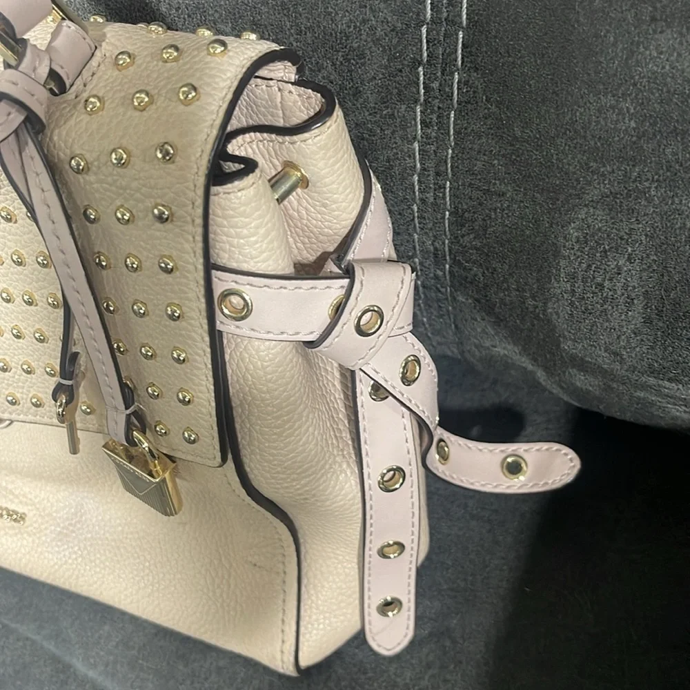 Michael Kors questions leave
